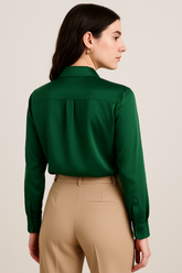 Emerald Green Satin Shirt for Women with full sleeves and a classic collar, styled with beige trousers.